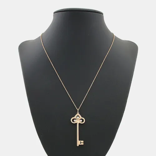 Tiffany & Co. Fleur de Lis Key 18k Rose Gold Diamond Pendant Necklace